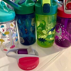 Bundle of 4 kids water bottles and extra lid